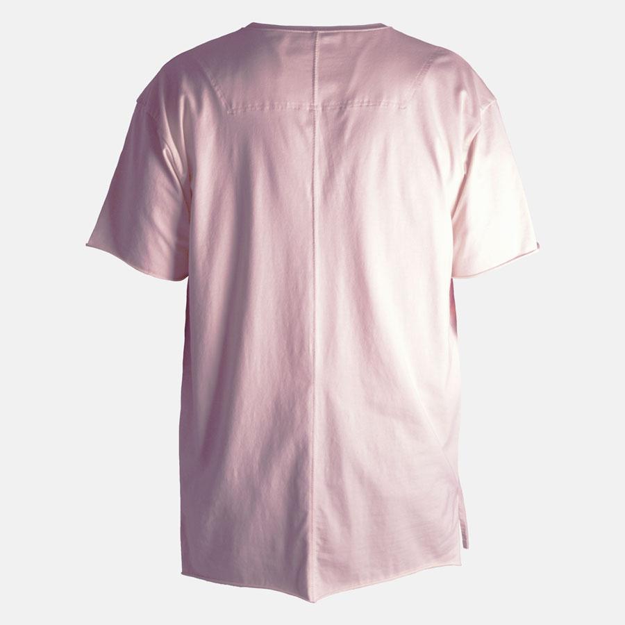 Closeup of a model wearing the Asylum tshirt in soft pink